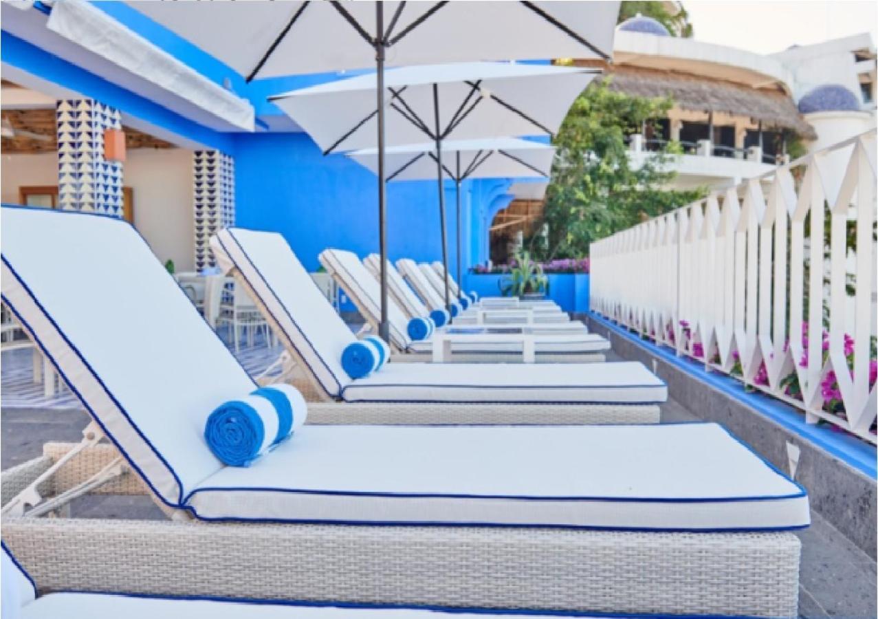 Hotel Luxury Patio Azul (Adults Only) بويرتو فالارتا المظهر الخارجي الصورة The pool at the Bel Air Hotel