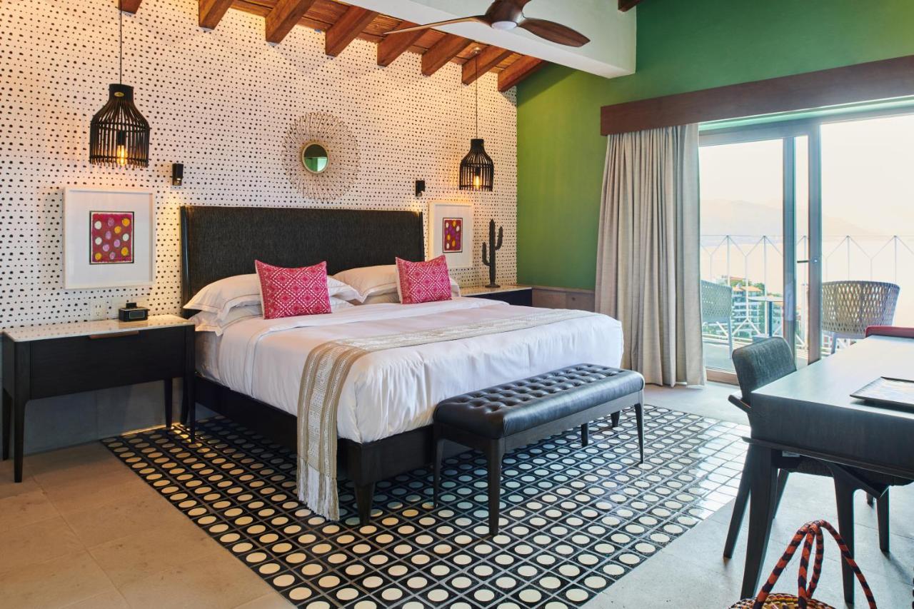 Hotel Luxury Patio Azul (Adults Only) بويرتو فالارتا المظهر الخارجي الصورة A bedroom at the hotel