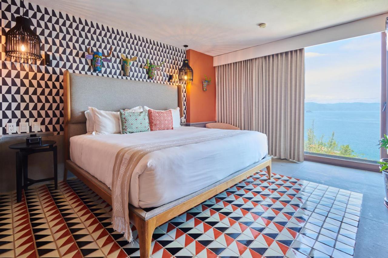 Hotel Luxury Patio Azul (Adults Only) بويرتو فالارتا المظهر الخارجي الصورة A bedroom at the hotel