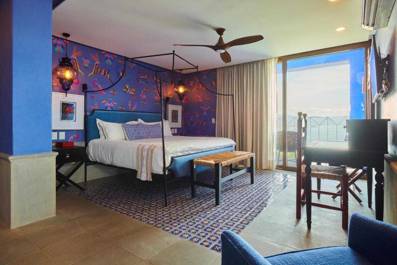 Hotel Luxury Patio Azul (Adults Only) بويرتو فالارتا المظهر الخارجي الصورة A bedroom at the hotel