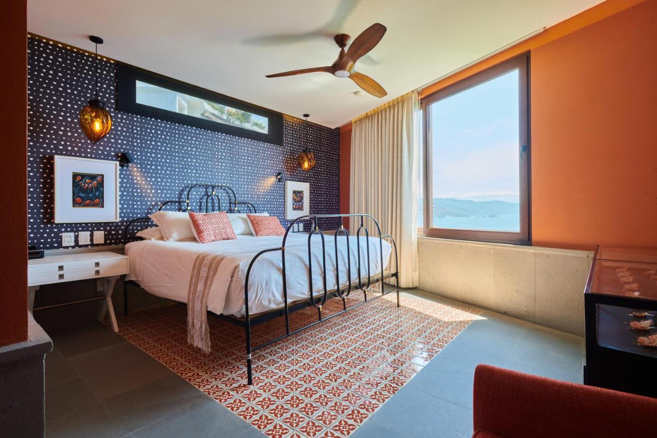 Hotel Luxury Patio Azul (Adults Only) بويرتو فالارتا المظهر الخارجي الصورة A bedroom at the hotel