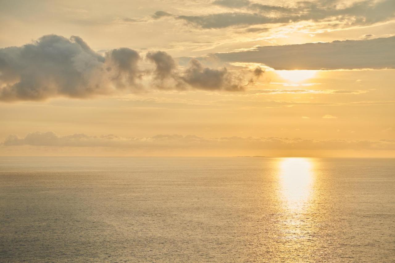 Hotel Luxury Patio Azul (Adults Only) بويرتو فالارتا المظهر الخارجي الصورة Sunset over the Atlantic Ocean