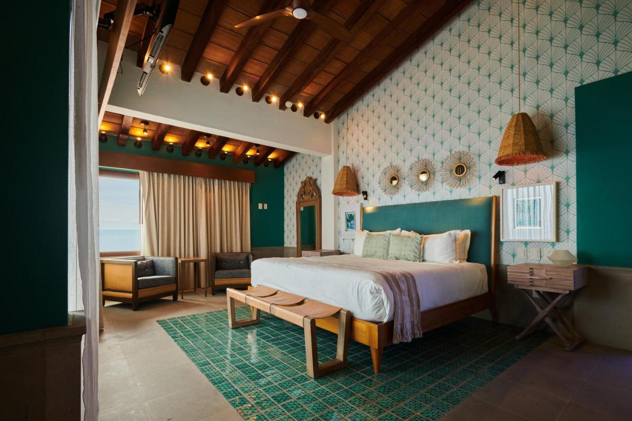 Hotel Luxury Patio Azul (Adults Only) بويرتو فالارتا المظهر الخارجي الصورة A bedroom at the hotel