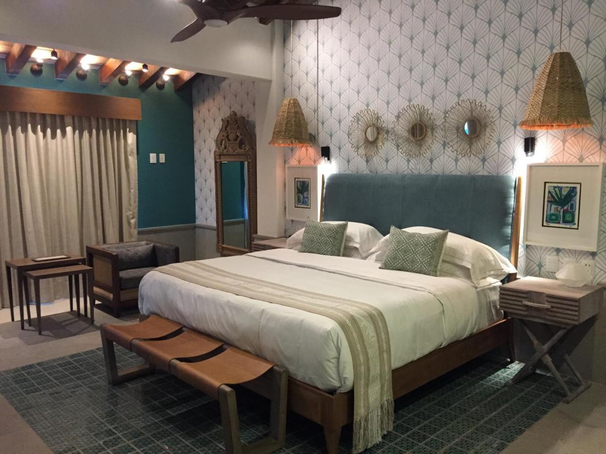 Hotel Luxury Patio Azul (Adults Only) بويرتو فالارتا المظهر الخارجي الصورة A bedroom at the hotel