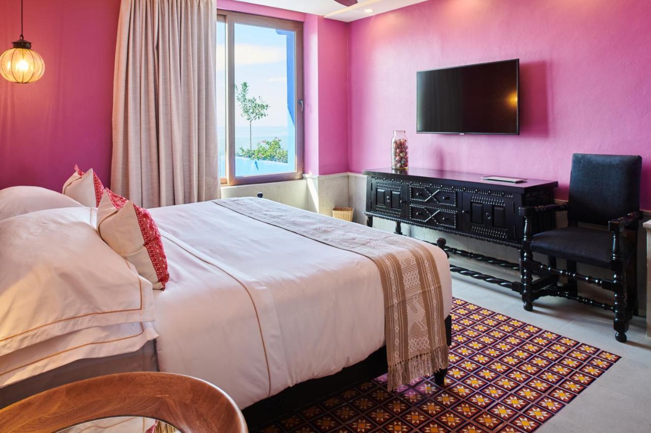 Hotel Luxury Patio Azul (Adults Only) بويرتو فالارتا المظهر الخارجي الصورة A bedroom at the hotel