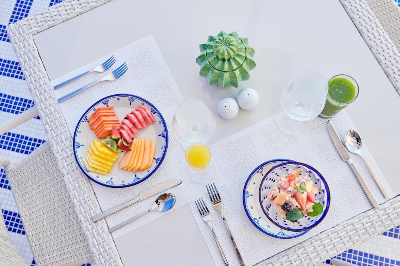 Hotel Luxury Patio Azul (Adults Only) بويرتو فالارتا المظهر الخارجي الصورة A place setting