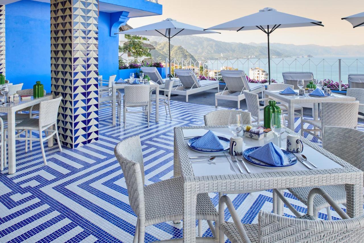 Hotel Luxury Patio Azul (Adults Only) بويرتو فالارتا المظهر الخارجي الصورة The rooftop bar at the hotel