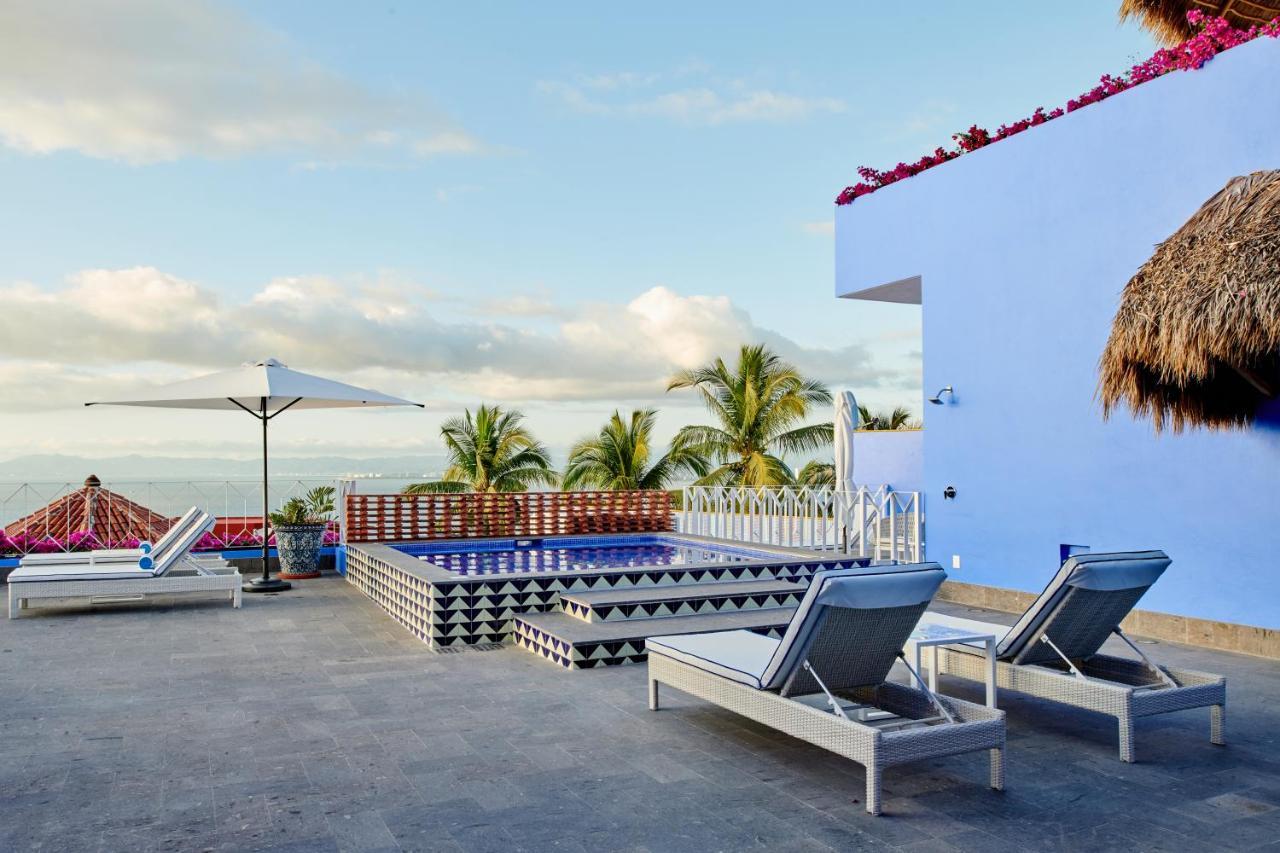 Hotel Luxury Patio Azul (Adults Only) بويرتو فالارتا المظهر الخارجي الصورة Rooftop pool at the Hotel Habita, Tulum, Mexico